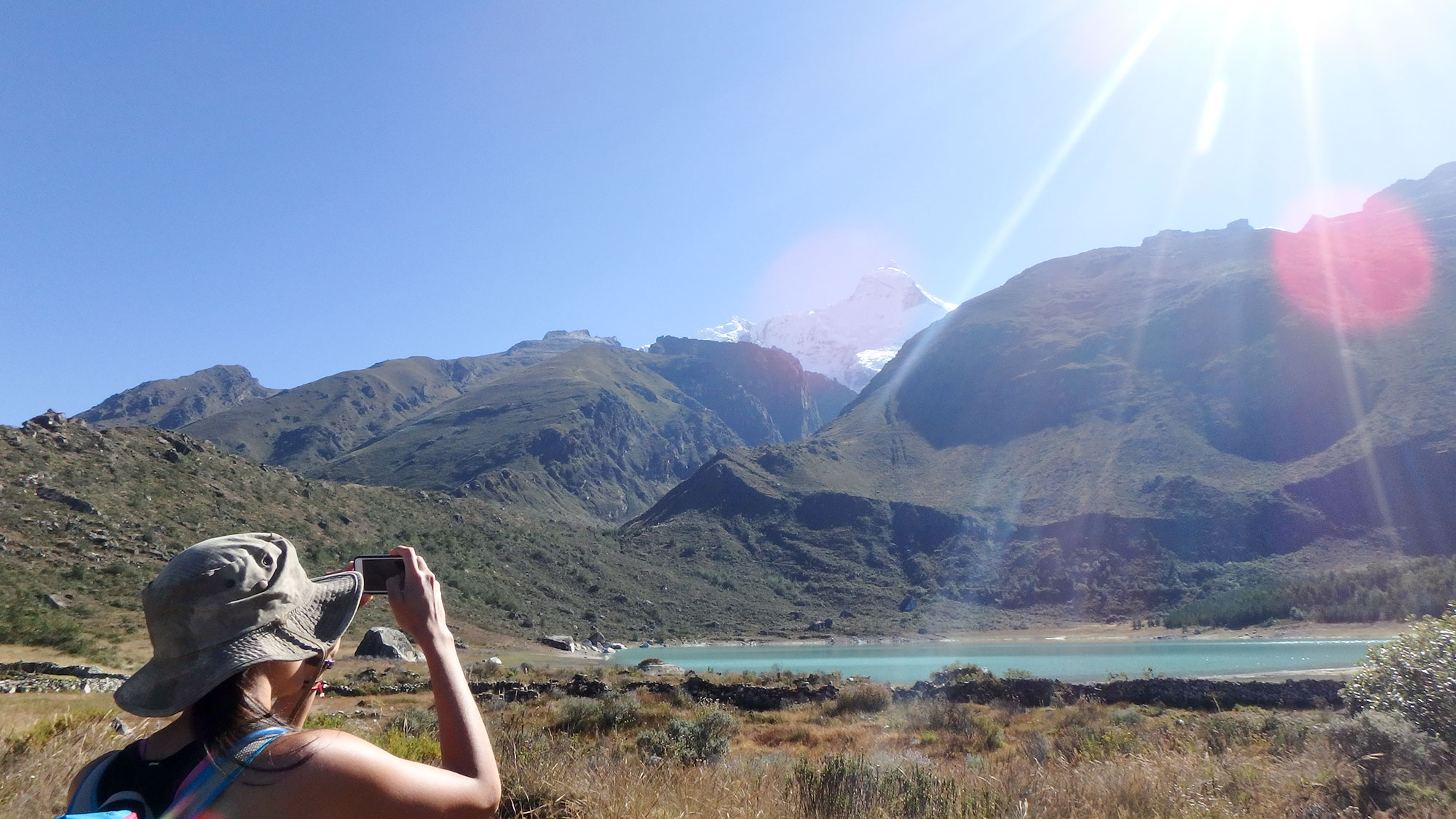 meghan taking photo of snow cap